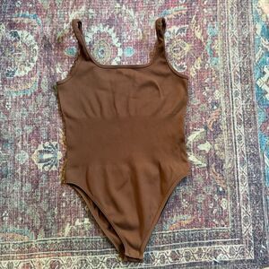 OQQ viral Women’s brown ribbed suck you in bodysuit